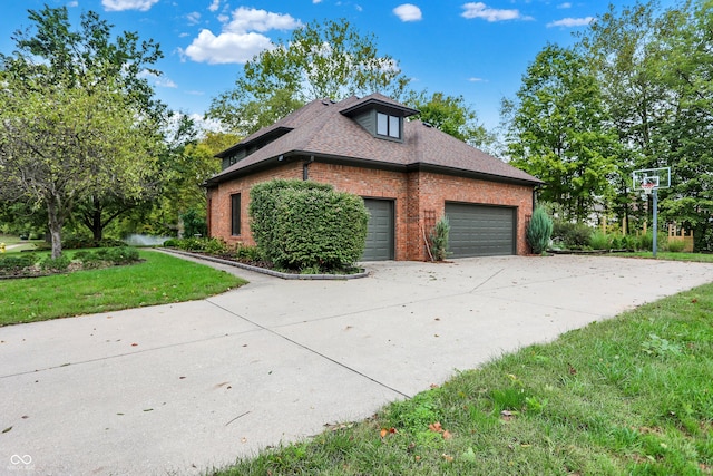 view of home's exterior with a lawn