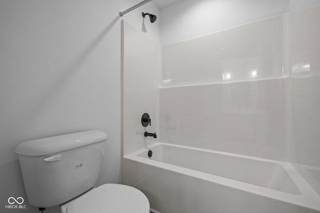 bathroom with toilet and  shower combination