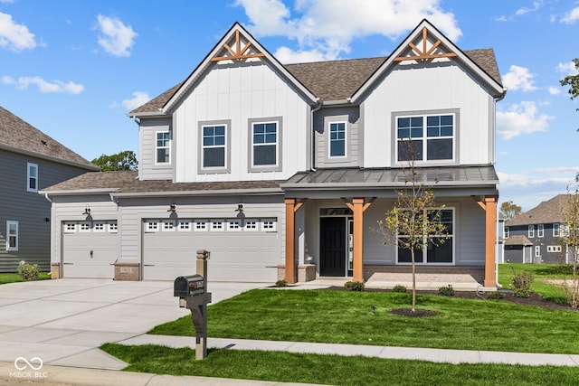 view of front of home featuring a porch, a front lawn, and a garage