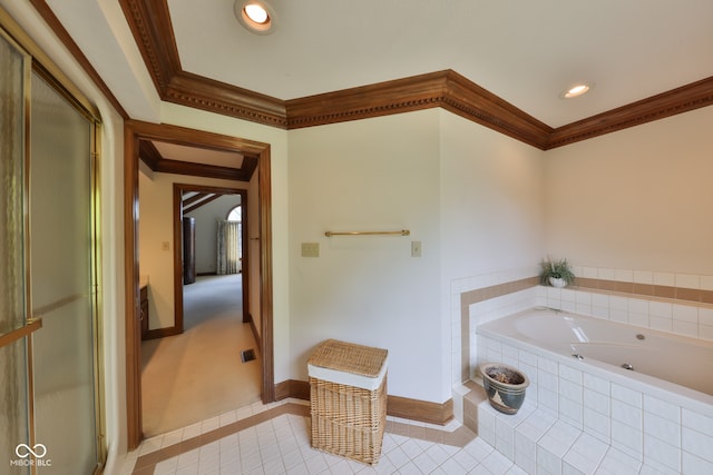 bathroom with crown molding, tile patterned floors, and separate shower and tub