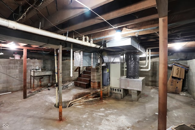 basement featuring water heater