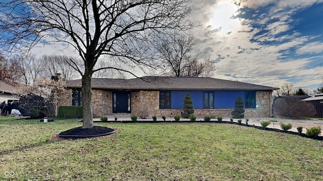 ranch-style home with a front yard