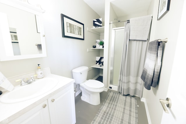 bathroom featuring vanity, toilet, and a shower with shower curtain