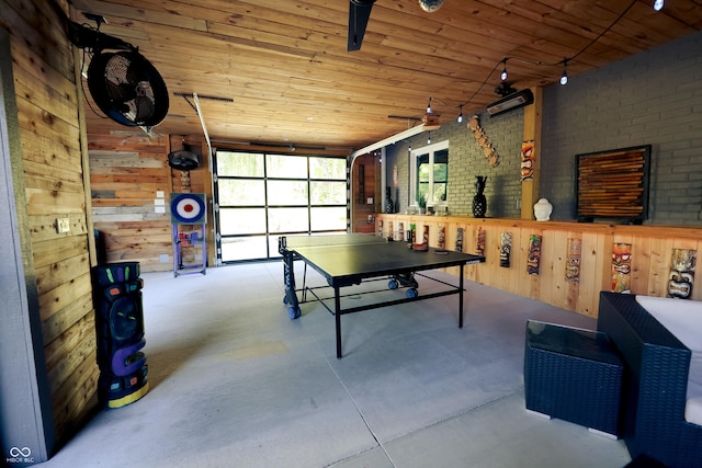 4270 Victoria Ln, Avon, IN 46123 - playroom with wood ceiling, wooden walls, concrete floors, a garage, and track lighting