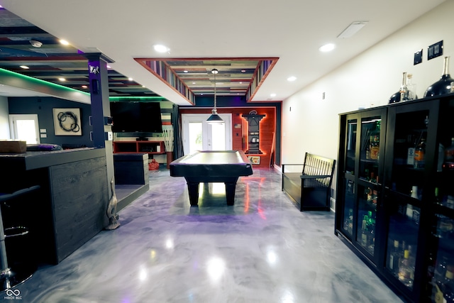 game room with pool table and concrete floors