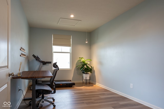 office area with light hardwood / wood-style floors