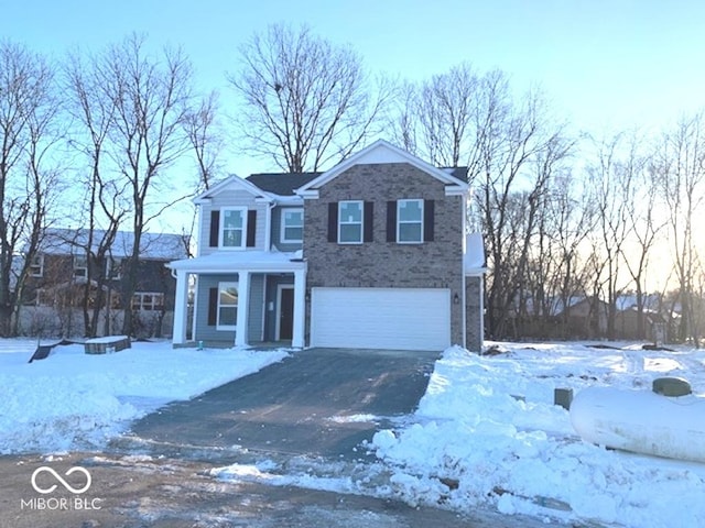 view of front of property featuring a garage