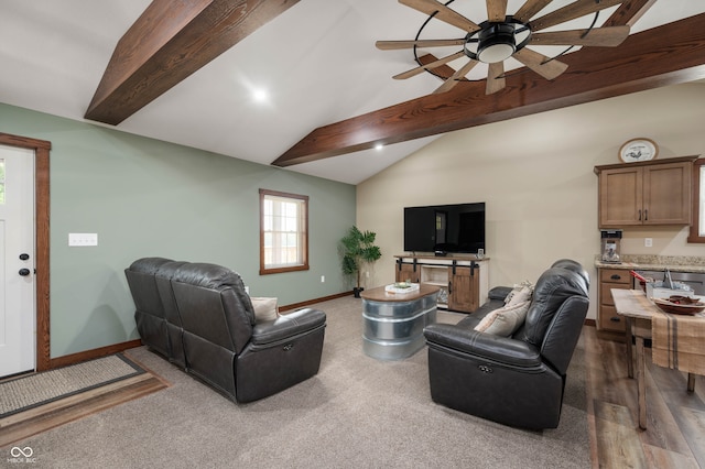 living room featuring lofted ceiling with beams, ceiling fan, and dark hardwood / wood-style floors