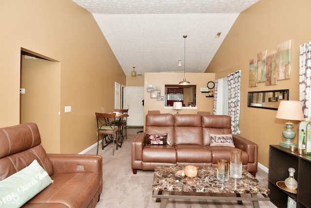 carpeted living room featuring a textured ceiling and vaulted ceiling