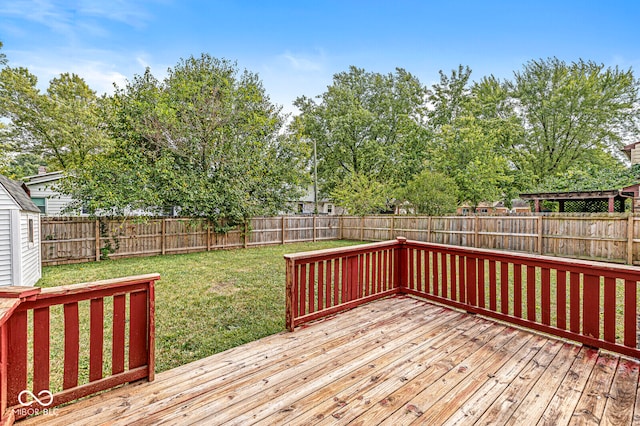 wooden deck with a yard