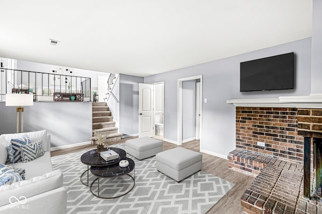 living room with hardwood / wood-style flooring