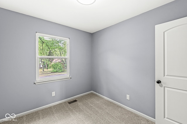 view of carpeted spare room