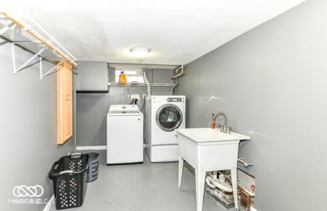 laundry area with washer and dryer