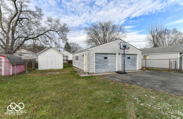 exterior space with a storage unit and a garage