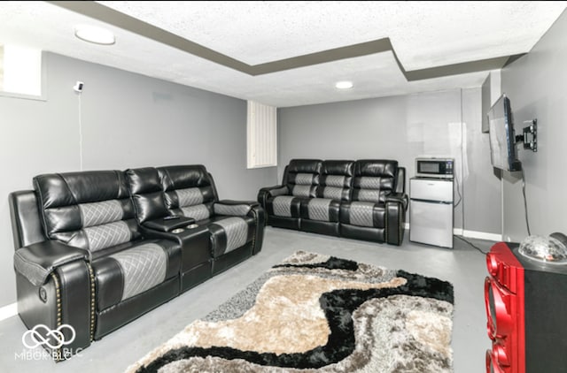 home theater featuring a textured ceiling