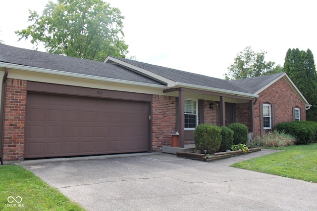 ranch-style home with a garage