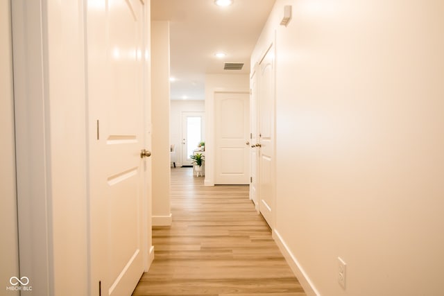 corridor featuring light wood-type flooring