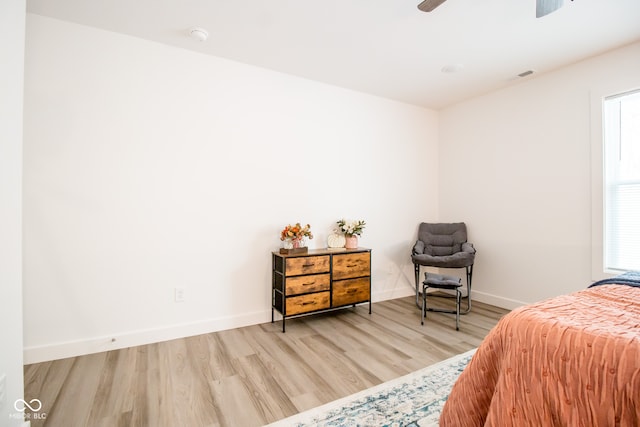 bedroom featuring ceiling fan and light hardwood / wood-style floors