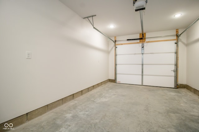 garage featuring a garage door opener