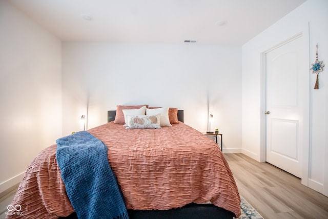 bedroom featuring light hardwood / wood-style floors