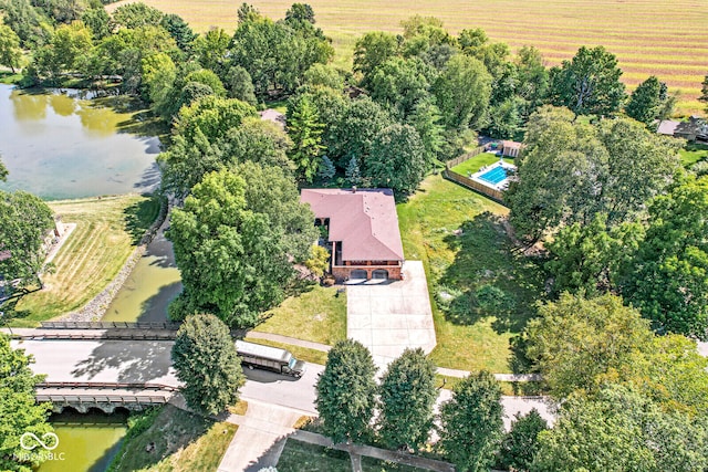 bird's eye view with a water view and a rural view