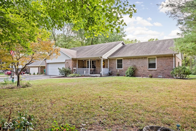 single story home with a garage, covered porch, and a front yard