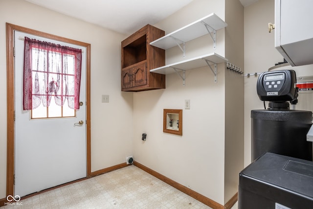 washroom featuring cabinets, hookup for a washing machine, and electric dryer hookup