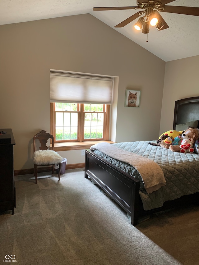 bedroom featuring lofted ceiling, carpet, and ceiling fan