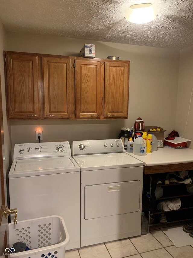 466 Sycamore Ridge Ct, Avon, IN 46123 - washroom with independent washer and dryer, cabinet space, and light tile patterned floors