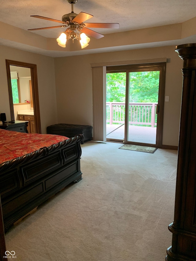 carpeted bedroom with access to outside and ceiling fan