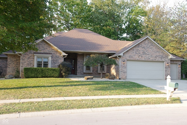 ranch-style home with a garage and a front yard