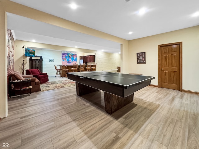 playroom with light wood-type flooring