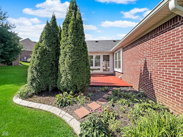 view of yard featuring a wooden deck