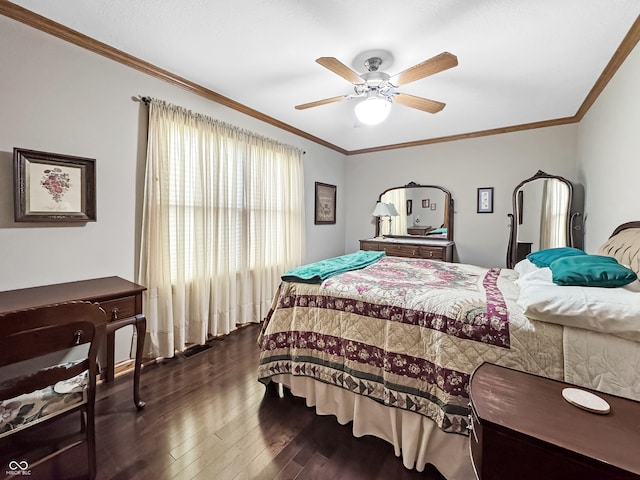 bedroom with ceiling fan, dark wood-type flooring, and ornamental molding