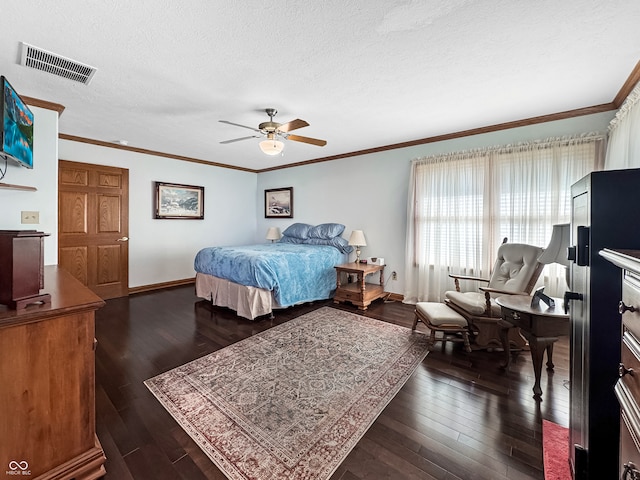 bedroom with ceiling fan, dark hardwood / wood-style floors, crown molding, a textured ceiling, and stainless steel fridge