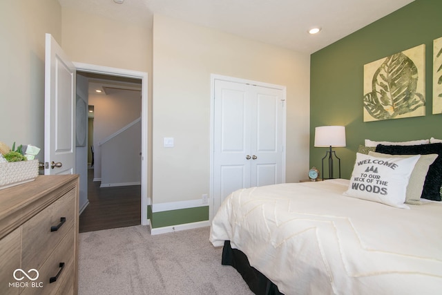 carpeted bedroom featuring a closet