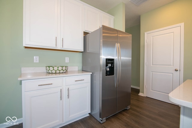 kitchen with white cabinetry, stainless steel fridge with ice dispenser, and dark wood-type flooring