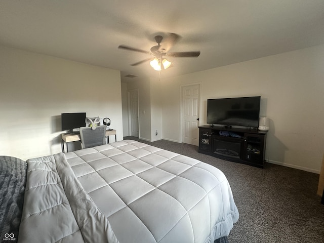 carpeted bedroom with baseboards and ceiling fan