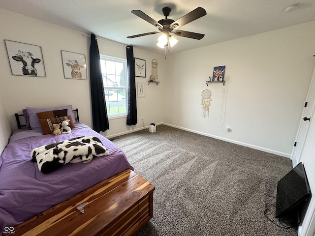 bedroom featuring baseboards, a ceiling fan, and carpet floors