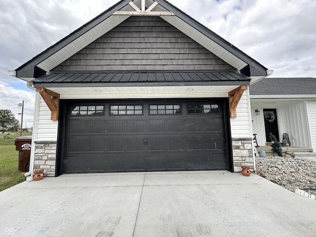 garage featuring driveway