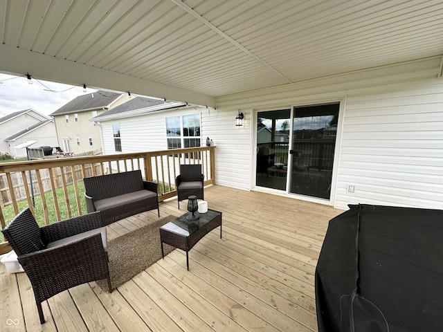 wooden deck with an outdoor hangout area