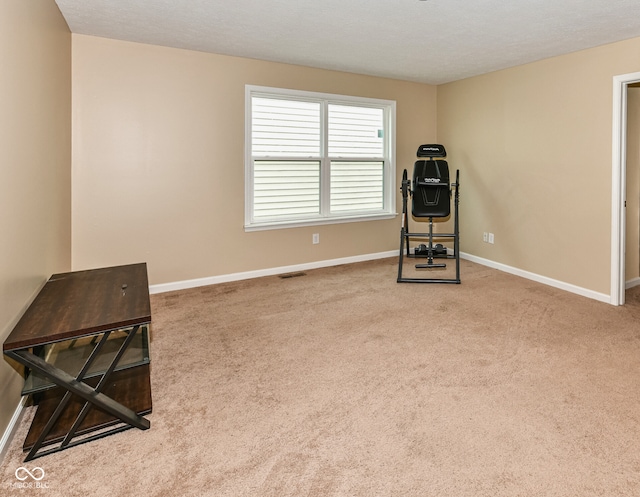 interior space featuring carpet