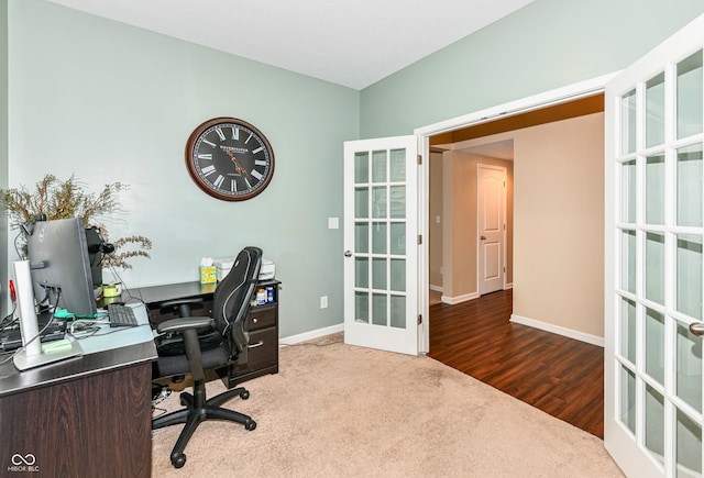 office with french doors and wood-type flooring