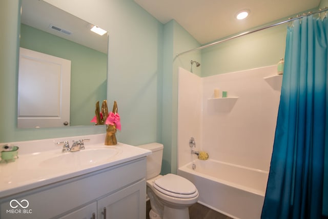 full bathroom with toilet, vanity, and shower / tub combo with curtain