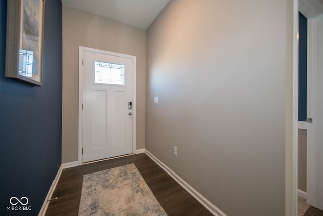 doorway to outside with dark wood-type flooring