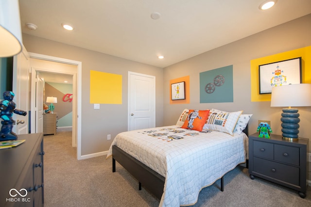 bedroom with light colored carpet