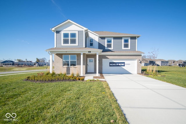 view of front of house featuring a garage and a front lawn