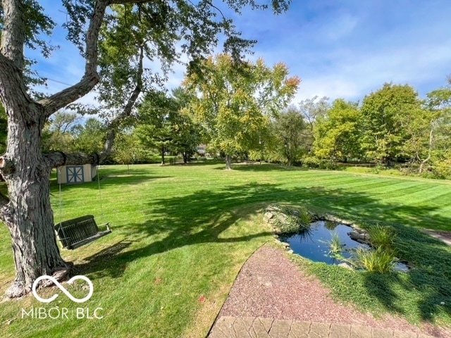 view of yard with a water view