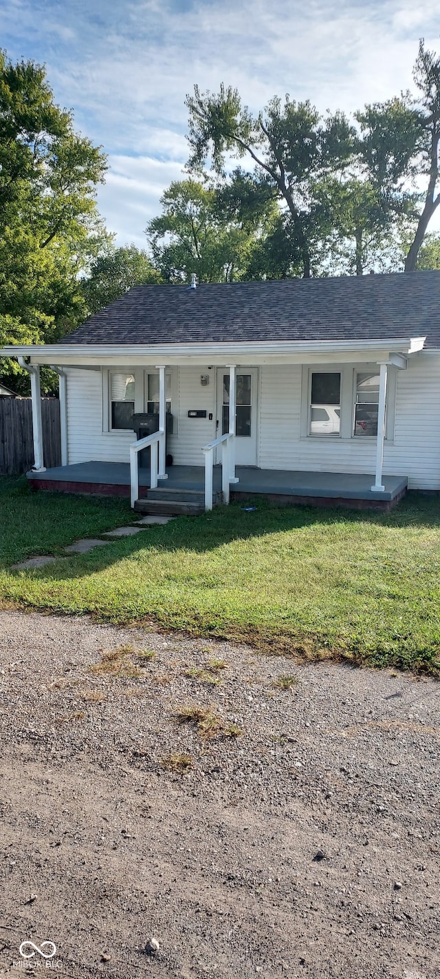 ranch-style house with a front lawn