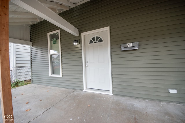 entrance to property with a patio area